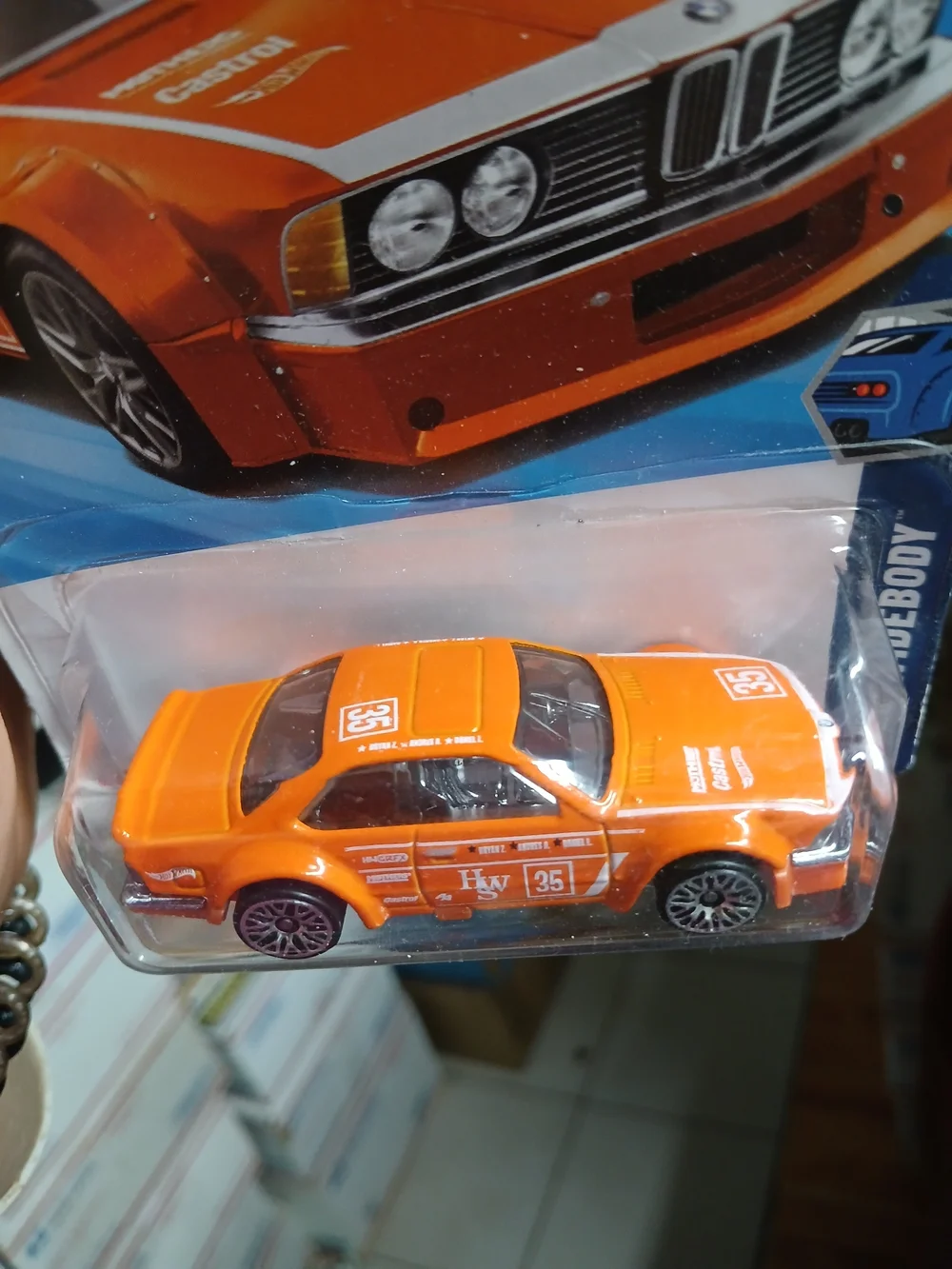 vibrant orange Hot Wheels Wild Widebody BMW 635 CSi from the 2025 mainline serie